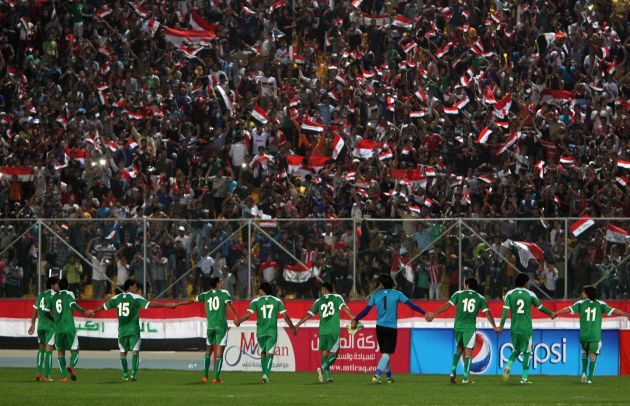 “It’s like a lover has returned” Gesturing toward the sea of people and the thousands of fluttering black, red and white Iraqi flags, Mr. Shamki said: “You don’t know who is Sunni or Shia or Christian. They are just chanting for Iraq.” The fans also...