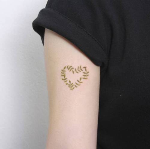 By Hyoa tattooer, done in Seoul. http://ttoo.co/p/35096 small;bicep;heart;leaf;conventional heart;watercolor;tiny;love;ifttt;little;hyoa;nature;twig;illustrative