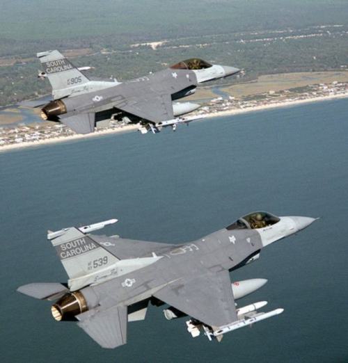 planesawesome - USAF two armed F-16C Block 52 Fighting Falcon...