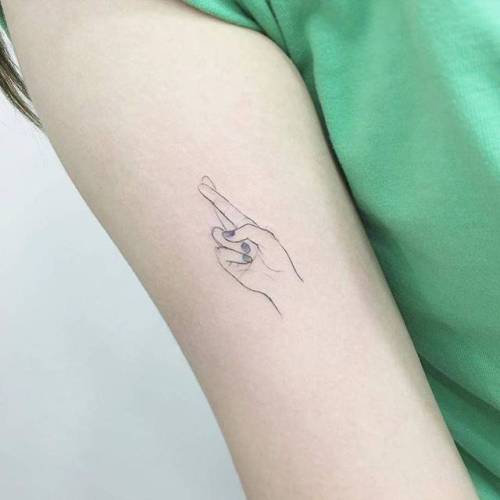 By Tattooist Flower, done in Seoul. http://ttoo.co/p/33289 hand;small;anatomy;single needle;bicep;crossed fingers;tiny;ifttt;little;tattooistflower