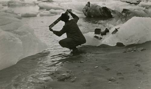 collectivehistory - Washing his films in iceberg-choked seawater...