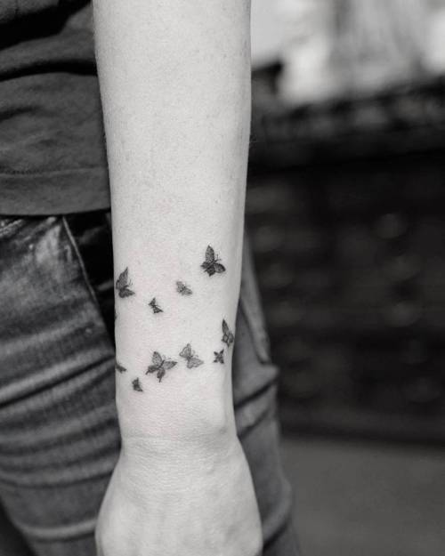 By Dr. Woo, done at Hideaway at Suite X, Los Angeles.... small;band;single needle;butterfly;animal;tiny;ifttt;little;wristband;wrist;drwoo;medium size;insect