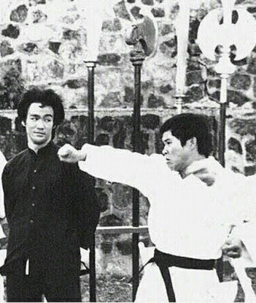 guts-and-uppercuts - Bruce Lee giving the side-eye to an extra on...