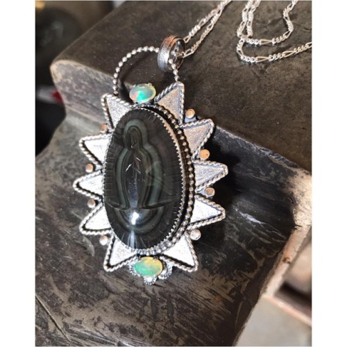Our Lady of Guad. Carved out of rainbow obsidian from Chiapas,...