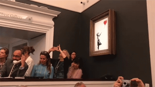 itscolossal:Banksy Painting Spontaneously Shreds Moments After...