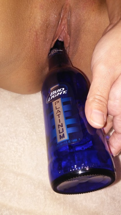 Inserting a Bud Light Platinum bottle in my pussy by follower...