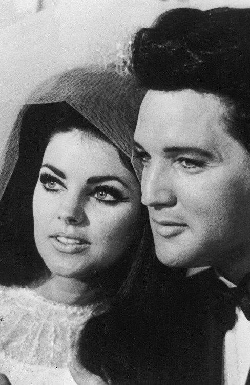 takingcare-of-business - Elvis and Priscilla Presley at a press...