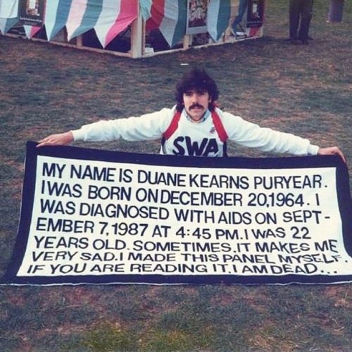 c86:Duane Kearns Puryear holding his own AIDS panel at...