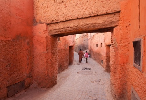 Morocco.Marrakech.A mother takes her little girl to school