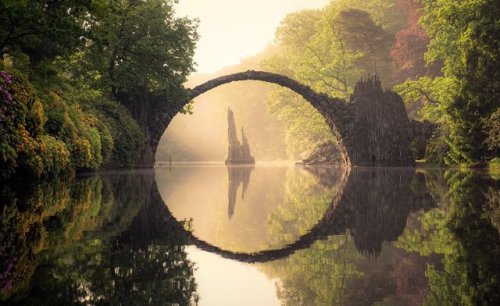 burntcopper:Kromlau bridge, Germany, during all four seasons.