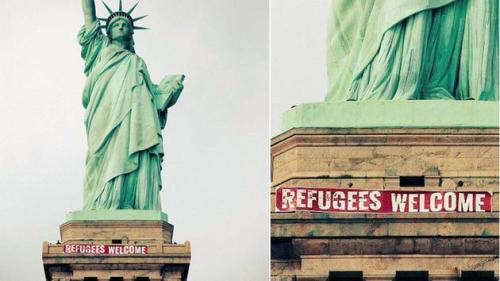 zoekravitzgirlfriend - banner hung on the statue of liberty this...