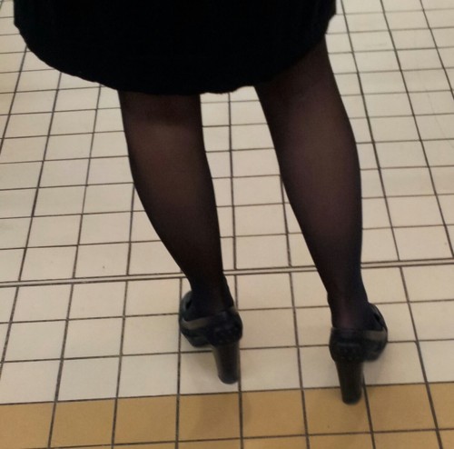 skirt…black pantyhose and heels