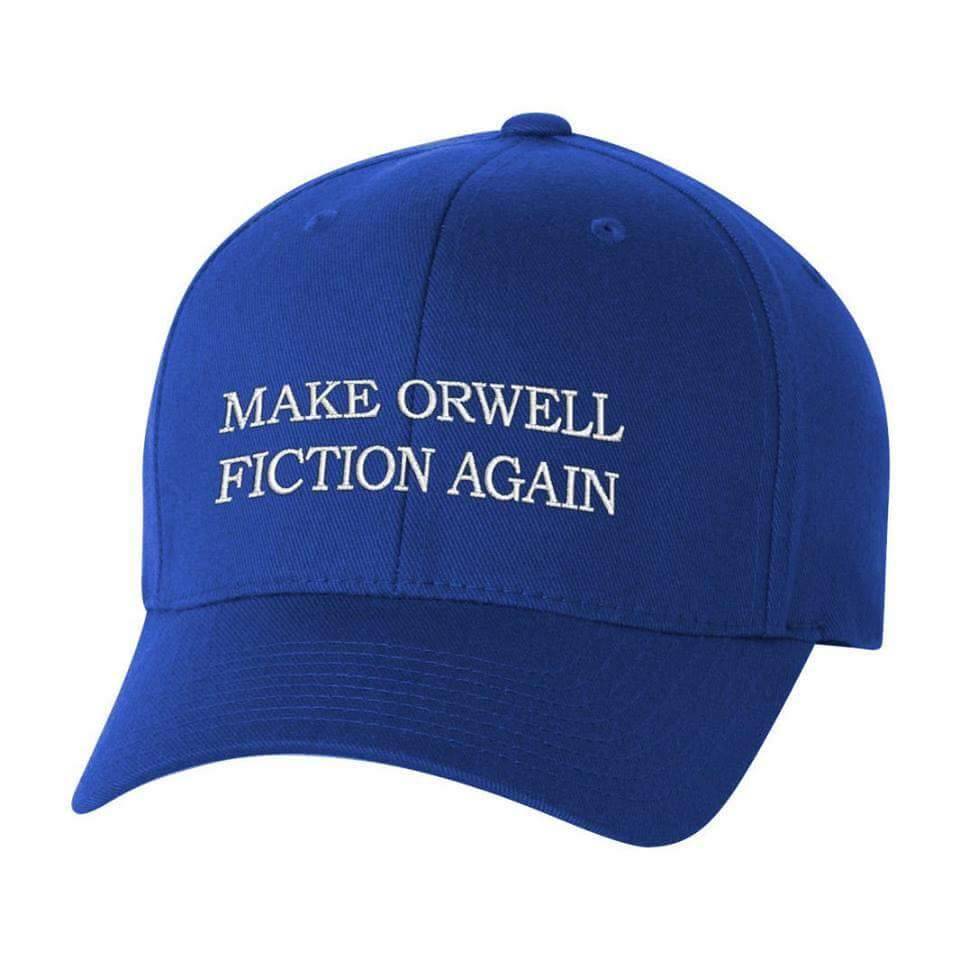Blue baseball cap bearing the motto, 