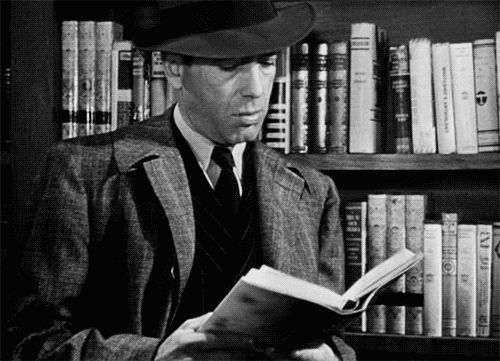 24hoursinthelifeofawoman:Bogart reading Chandler on the set of...