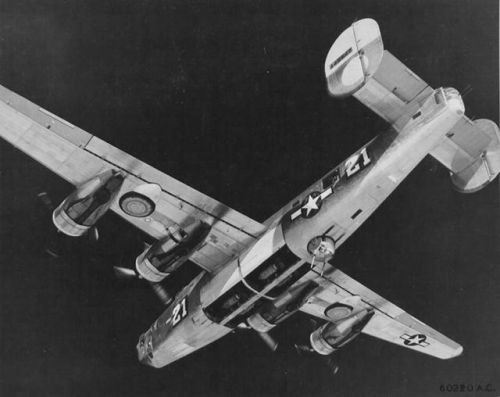 warhistoryonline - Underside view of a B-24L Liberator of the...
