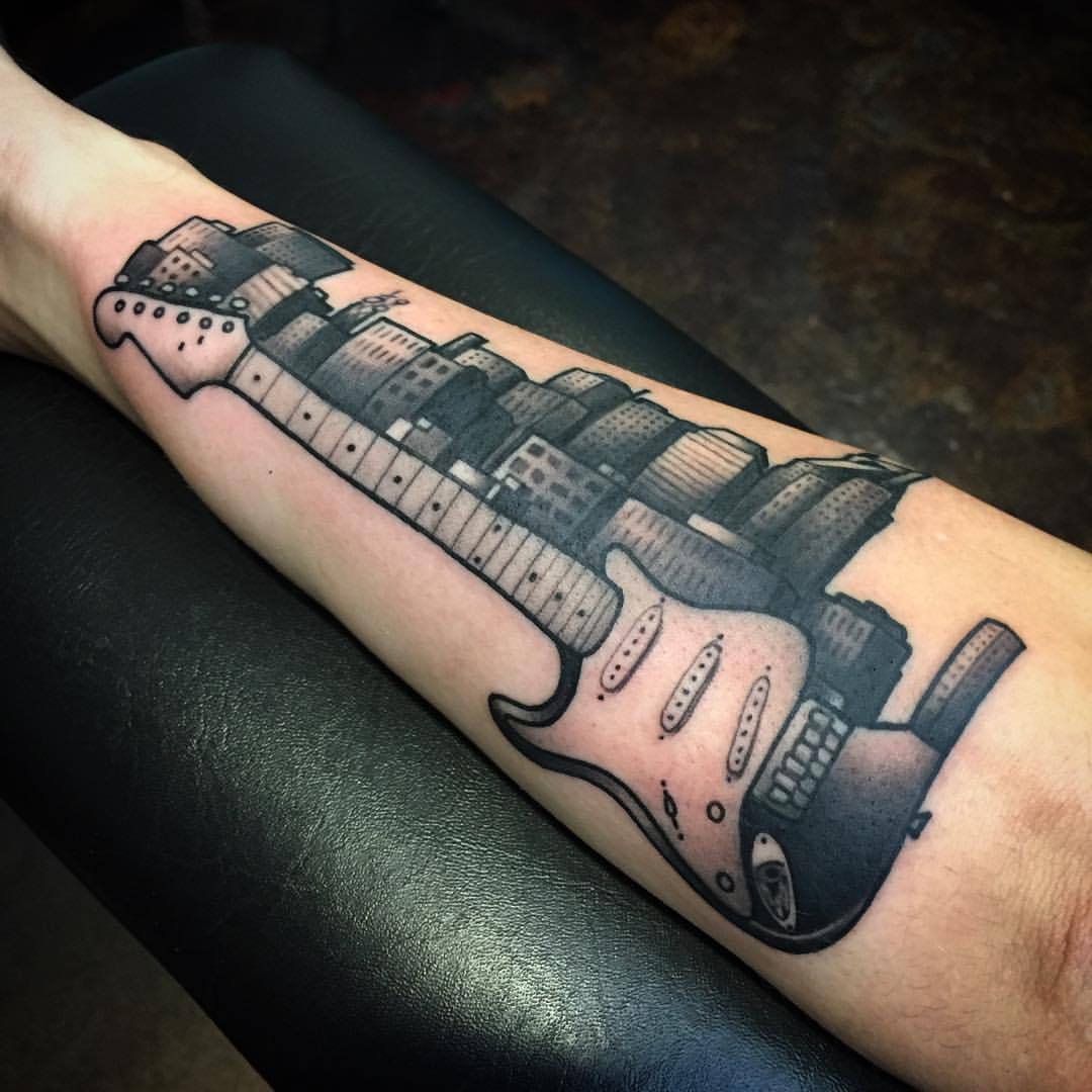 Tattoos by Brad Dozier — Made this cool little guitar and 