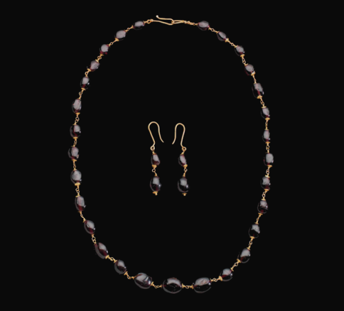 Ancient Roman garnet necklace and earrings, dated to the 3rd to...