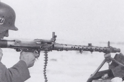 vaguedacier - A Waffen-SS soldier with a MG-34 on the Eastern...