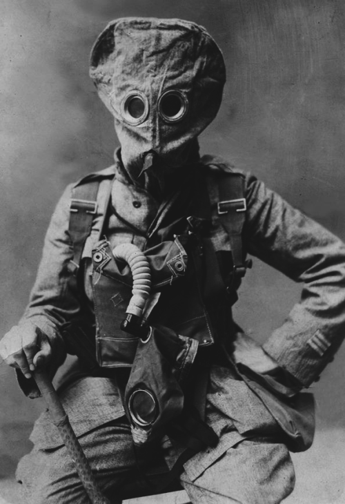 atlantic-melancholy:Portuguese soldier posing with a gasmask,...