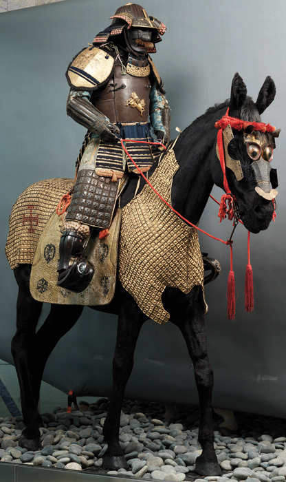 thekimonogallery - Museum exhibit of samurai on horseback.  The...