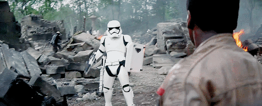 Storm Trooper FN-2199 - TR-8R - from Star Wars the Force Awakens - Storm Trooper Throws Down His Gun and Shield GIF