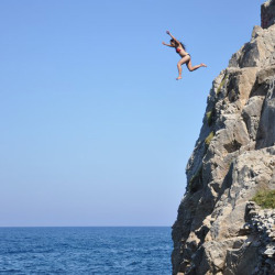 Cliff jumping at Kamari Beach