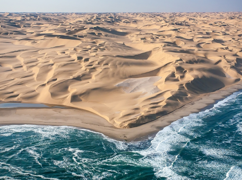 sixpenceee:This is where the Namib desert meets the Atlantic...