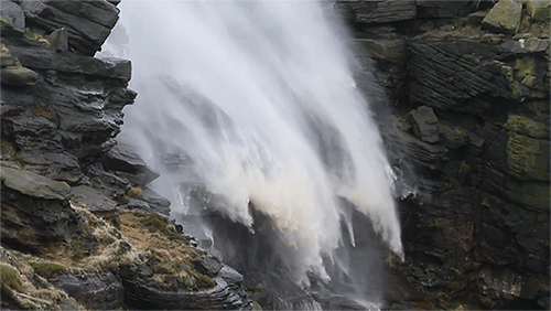 cracksandcraters:itscolossal:Extreme Winds Cause a Waterfall...