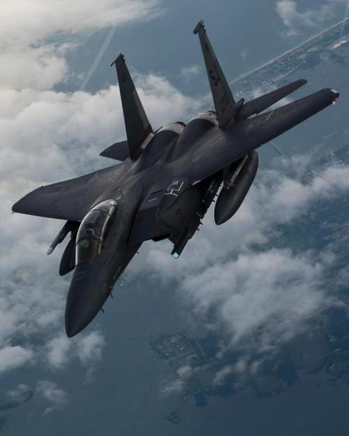 planesawesome - An F-15E Strike Eagle waits to be refueled during...