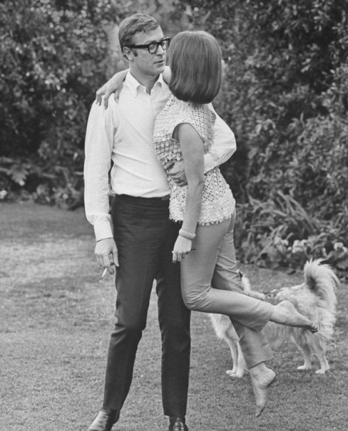 my-retro-vintage:Michael Caine sweeping Natalie Wood off her...