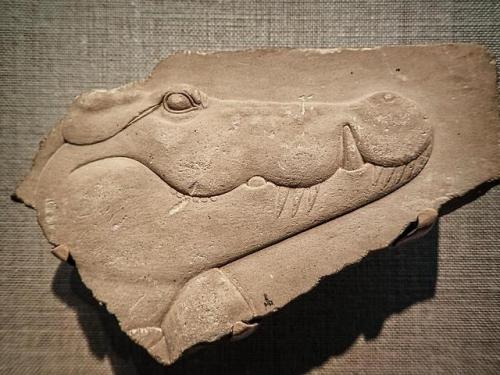 dwellerinthelibrary:Plaque with the head of a crocodile...
