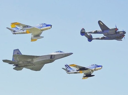 planesawesome - Fly by of an F-22 a pair of F-86’s and a P-38...