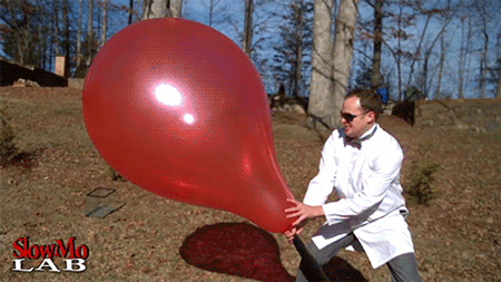 fencehopping - Giant balloon popping in slow motion.