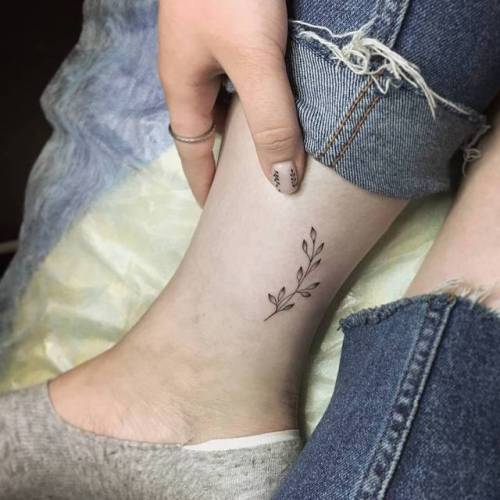 By Li Kuprina, done in Moscow. http://ttoo.co/p/34462 sprout;flower;small;likuprina;leaf;tiny;ankle;ifttt;little;nature;minimalist