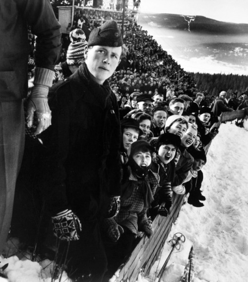 semioticapocalypse - Robert Capa. Spectators watching a Winter...