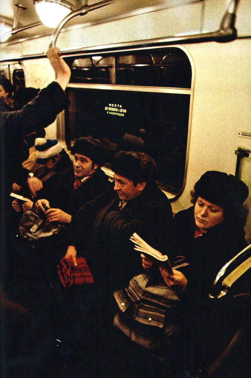 vintagenatgeographic - Magazines and paperbacks occupy riders on...
