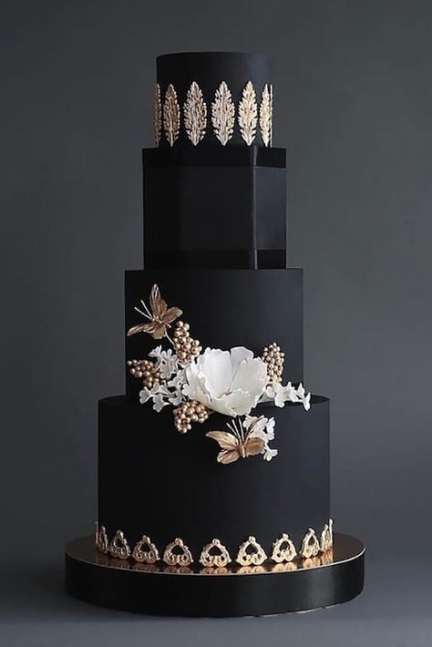 Black wedding cake with gold appliques