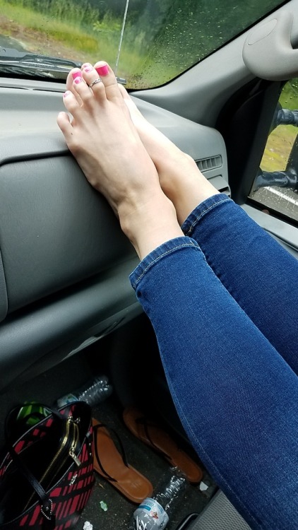 My pretty wifes beautiful feet relaxing up on the...