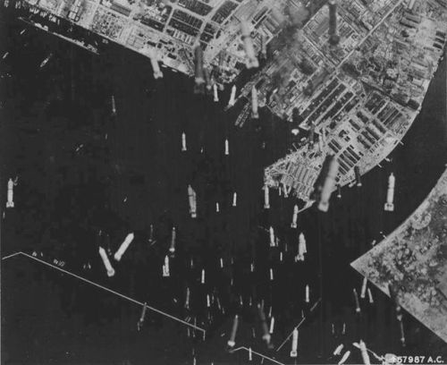 warhistoryonline - Bombs falling on the port of Osaka, Japan,...