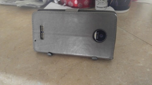 Finished the phone stand for my fatherIt now holds a phone,...