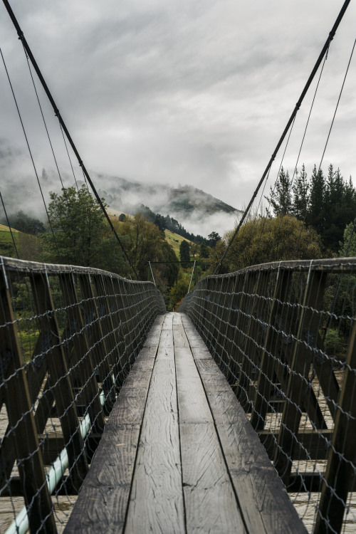 heidigrainger:moody-nature:one of many swing bridges at New...