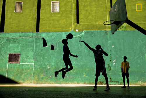 roseseafoam - Young boys play basketball after school in a Havana...