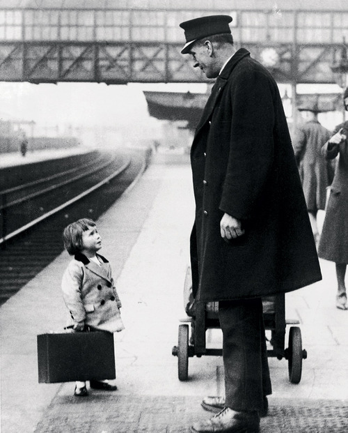 collectivehistory - A young passenger asks a station attendant...
