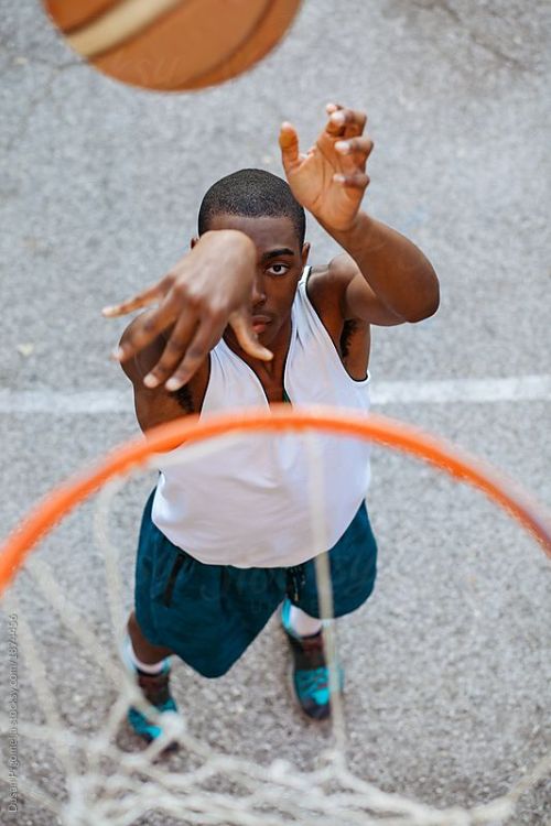 Young Black Man Playing Basketball Outdoor By ANDAvailable to...