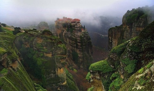 Meteora is a monastery complex in Kalabaka, Greece, perched on...