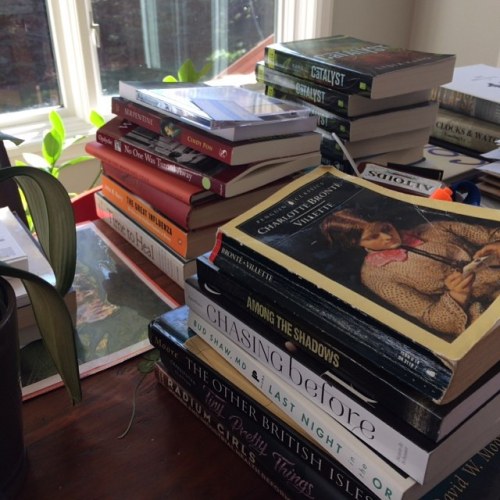 My writing space constantly grows these towers of books. New...