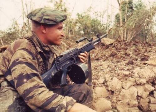 warhistoryonline - A U.S. Navy SEAL in Vietnam keeps his Stoner...