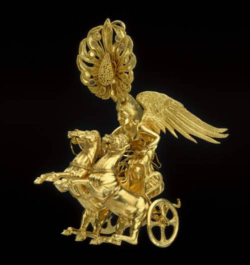coolartefact:Earring with Nike driving a two-horse chariot...