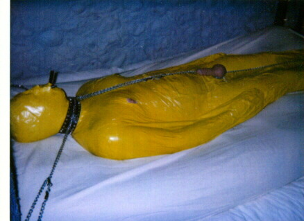 thetomblur - yellow tape mummified men-caged
