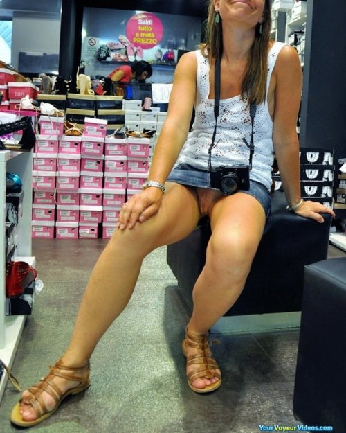carelessinpublic:Inside a shop in a short skirt and showing...